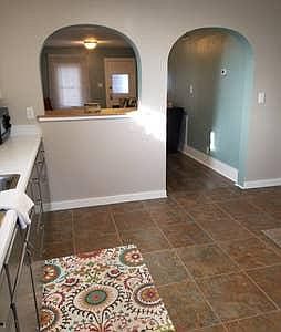 Kitchen/view into living room - furnishings NOT INCLUDED