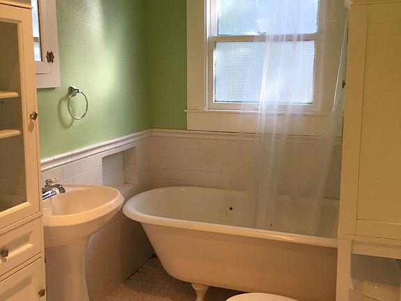 Bathroom with claw foot tub