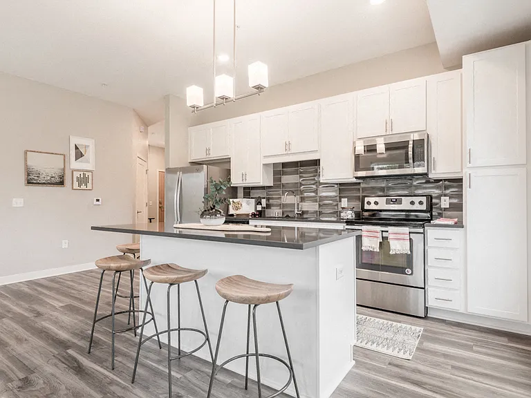 Open layouts with kitchen islands provide extra counter space and room to gather.