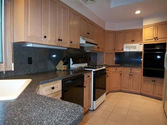Beautifully Designed with Lots of Cabinets!