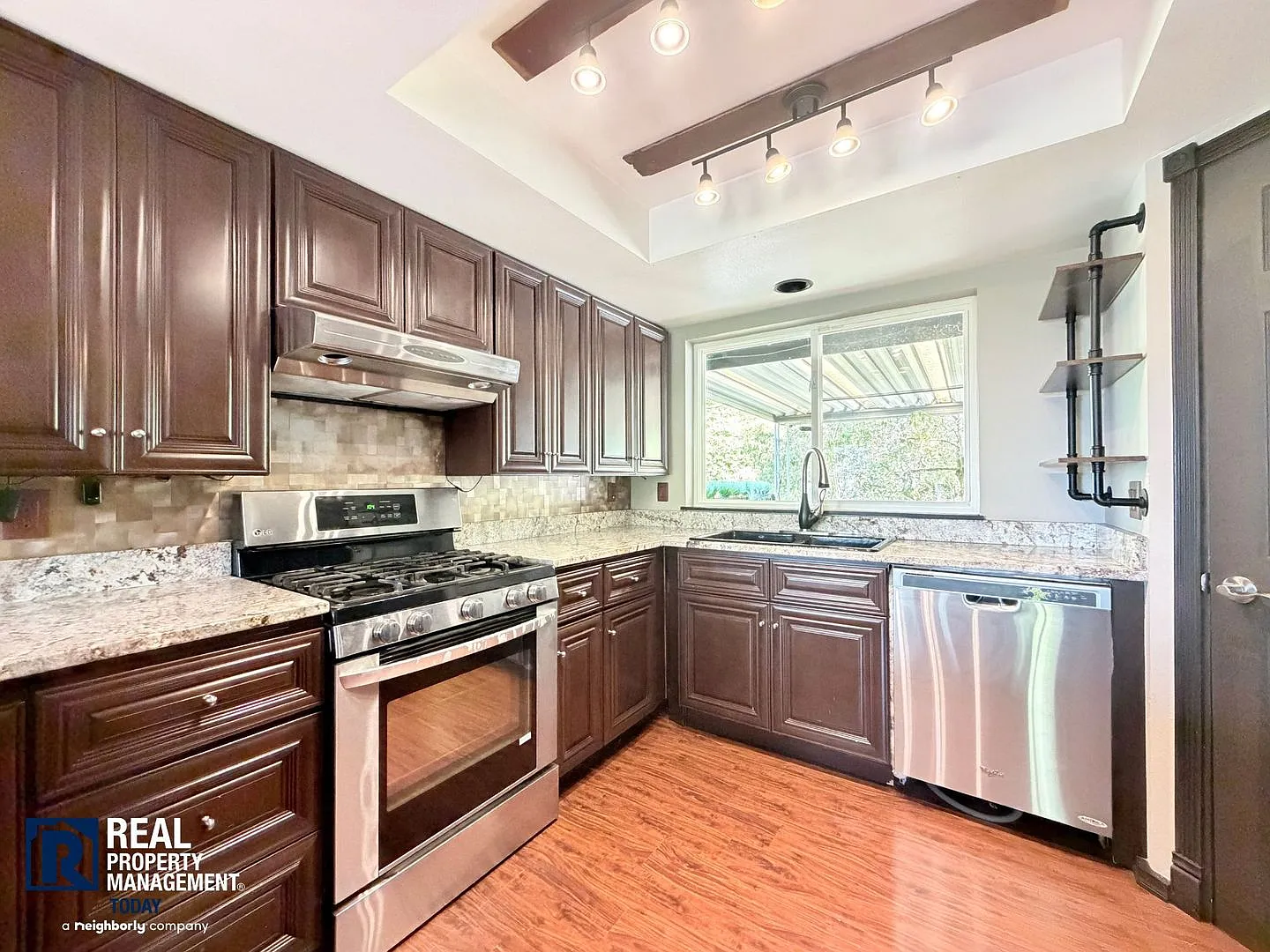 Rare 4-Bedroom Puyallup Home with Full Lower-Level Suite, Updated Kitchen & Balcony! — Photo 4