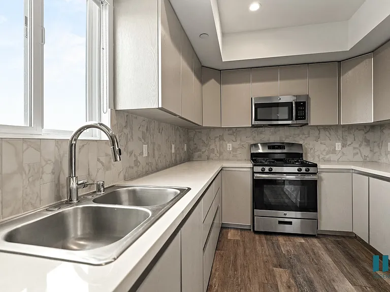 Kitchen with Energy-Efficient Appliances and Ample Cabinet Storage