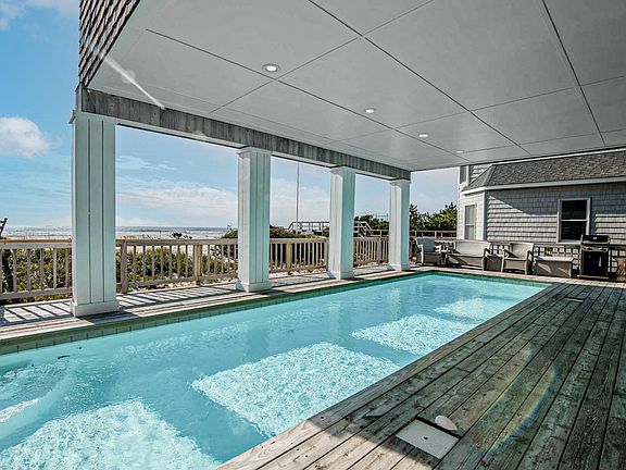32' Gunite pool with your ocean boardwalk beyond. Enjoy your day at your beach or swimming in your pool the bbq poolside!