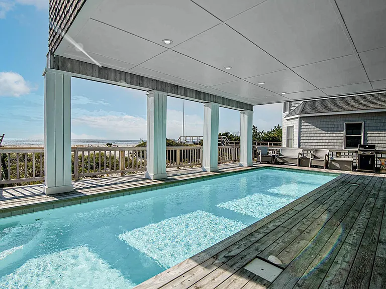 32' Gunite pool with your ocean boardwalk beyond. Enjoy your day at your beach or swimming in your pool the bbq poolside!