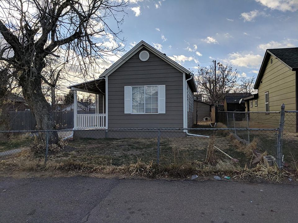 Large Fenced Yard with house and patio off of front door