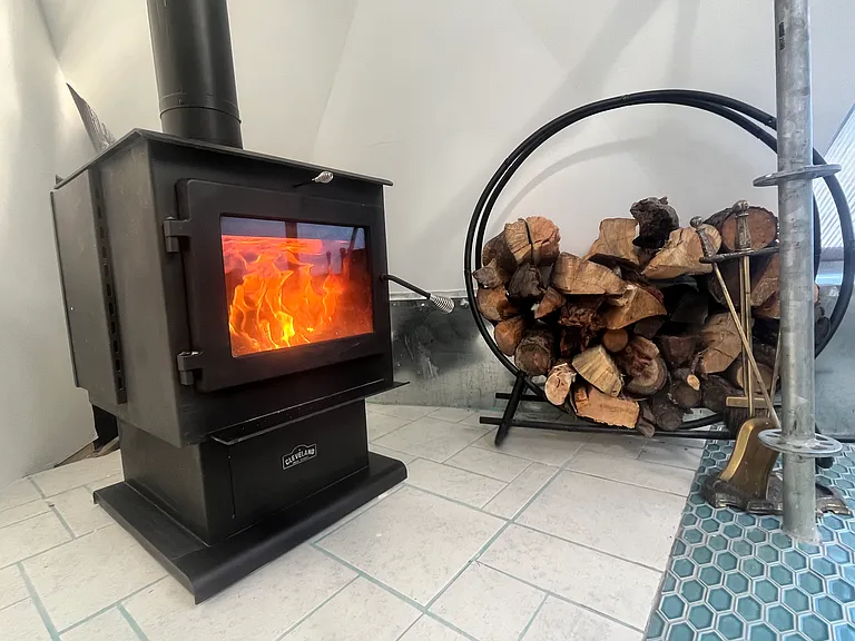 New, modern wood stove is super efficient and easy to use.
