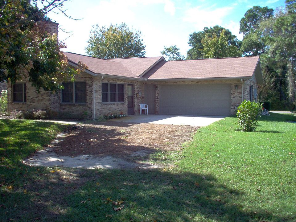 2-car attached, side entry garage.