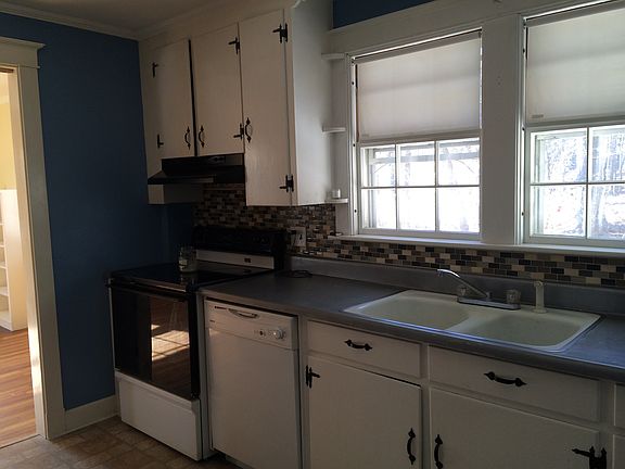 Cozy kitchen with all appliances.