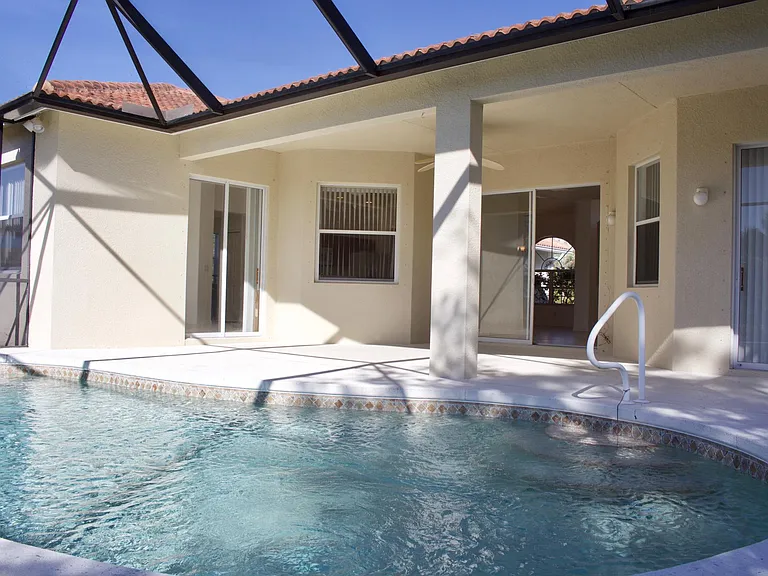 Screened in pool 4 seasons room.