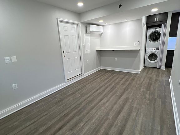 Living room area with breakfast bar. Entrance to main house double locked from both sides.