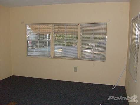 FRONT LIVING ROOM WITH BAY WINDOW