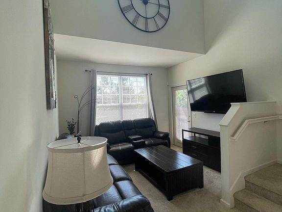 Living area with door to balcony