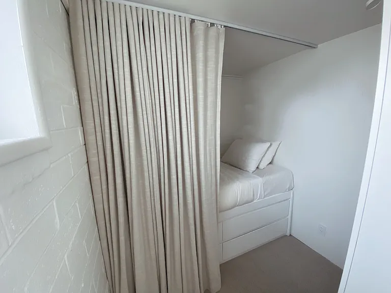 Custom sleeping alcove #2 with wardrobe storage