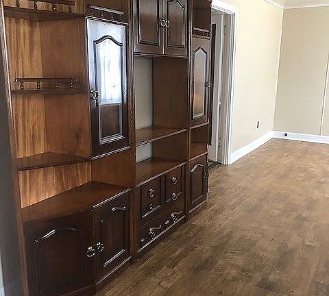 living room with wall unit