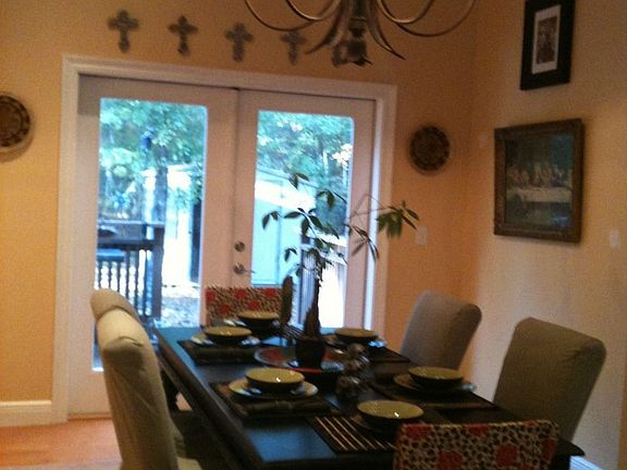 Open Formal Dining with Wide Plank Wood Floors