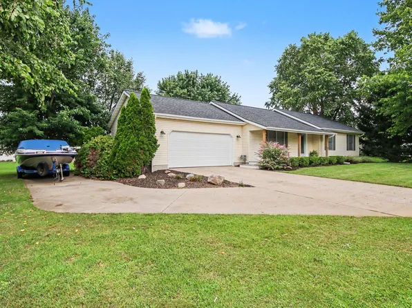 4318 Saturn Dr, Dorr, MI 49323