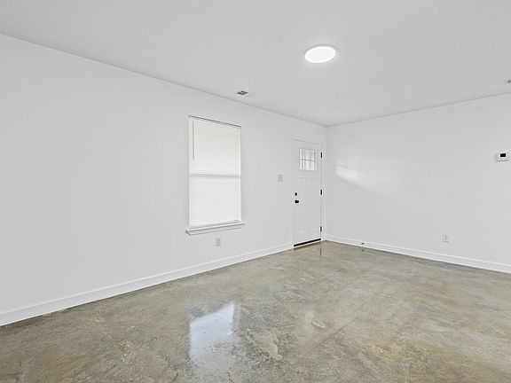 Open interior space with great natural light and fresh paint throughout