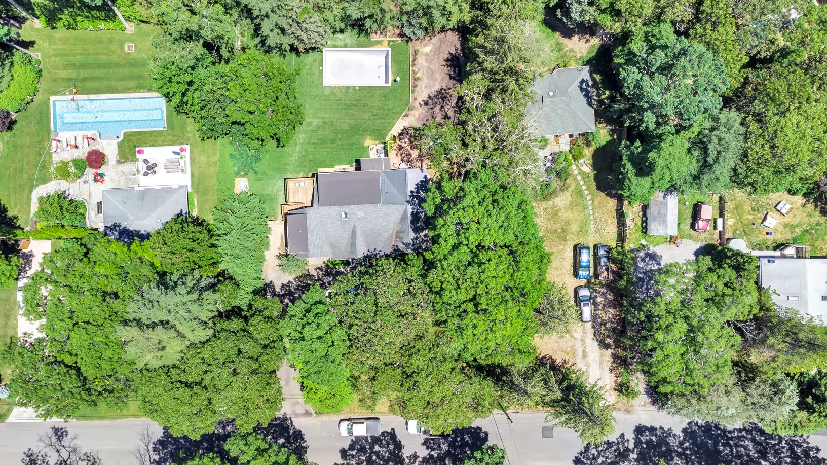  Aerial Shot Of House With Gray Gunite Salt Water Pool