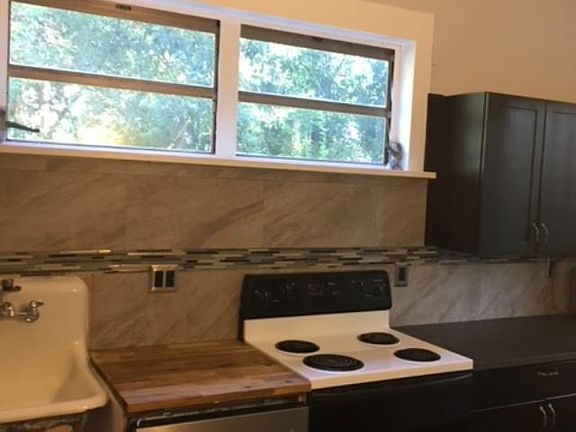 New dishwasher, cabinets, and backsplash
