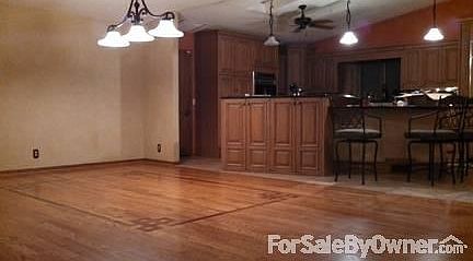 Formal Dining Area
						:
						Beautiful formal dining area with custom inlays in the hard wood.