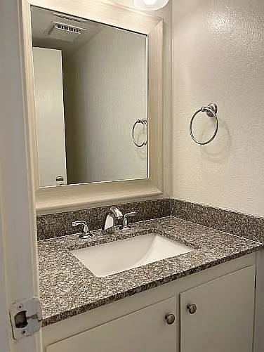 Half Bath with Sink, Vanity and Toilet