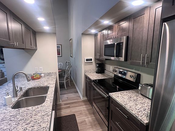 Lots of counter space and pull out drawers in cabinets, pantry cabinet too.