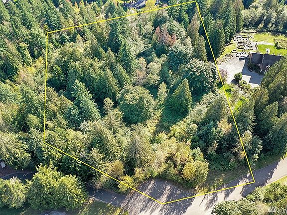 Rare 5 acres of property located in "The Country" with double access off 162nd Ave & 163rd Ave