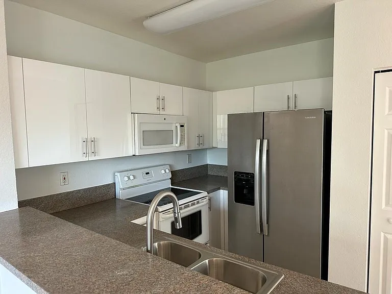 1570 NE 33rd Rd #201 — Photo 15