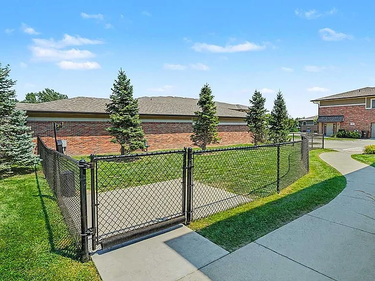 Open green spaces invite daily play, giving everyone room to run, connect, and enjoy time outdoors together with their pets.