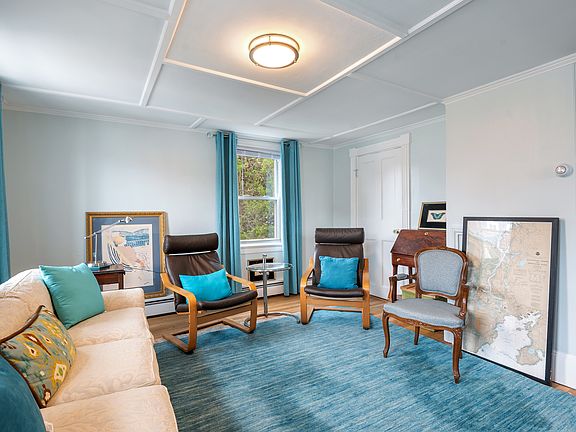 Living room with a TV for streaming.