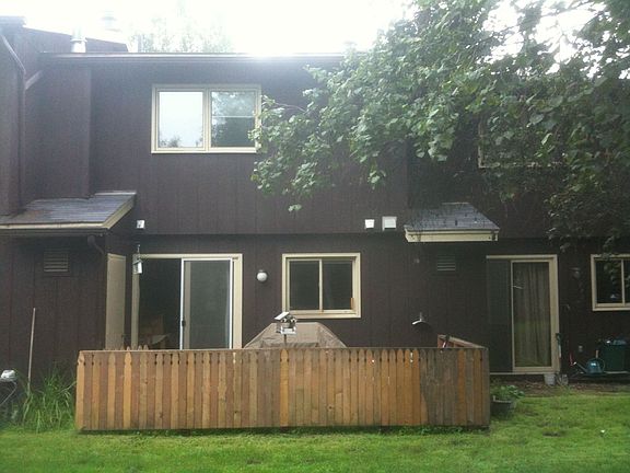 The enclosed patio from the back yard.
