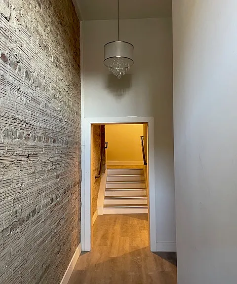 Exposed brick entryway.
