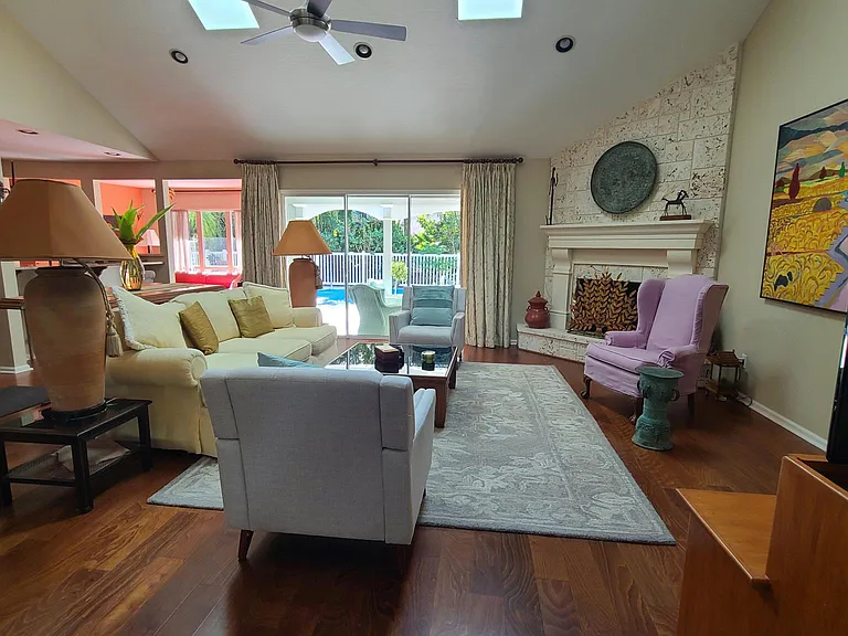 Sliders to the pool, drapes for privacy