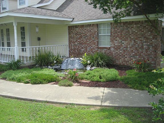 FRONT GARDEN AREA W/FISHPOND