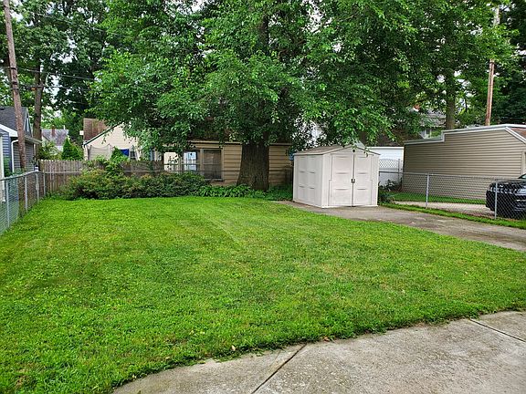 backyard with patio and storage shed