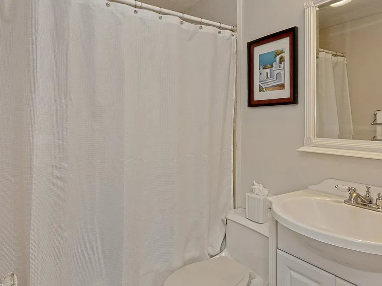 Full bath with tub/shower on the upper level.