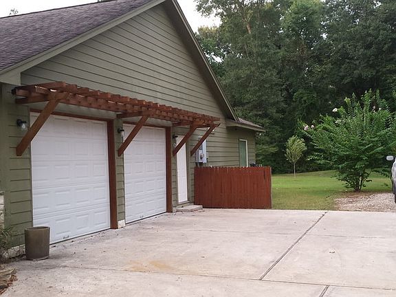 2 car garage : Cedar pergola over the garage