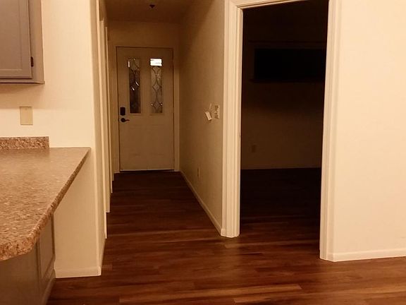 Standing at front door looking inward