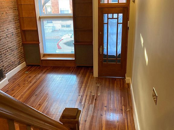 Stairway from 2nd floor down to 
 living area at front of house