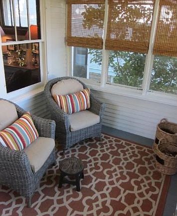 Sunny front porch is a welcoming spot to relax!  New front entry full view screen door too!
