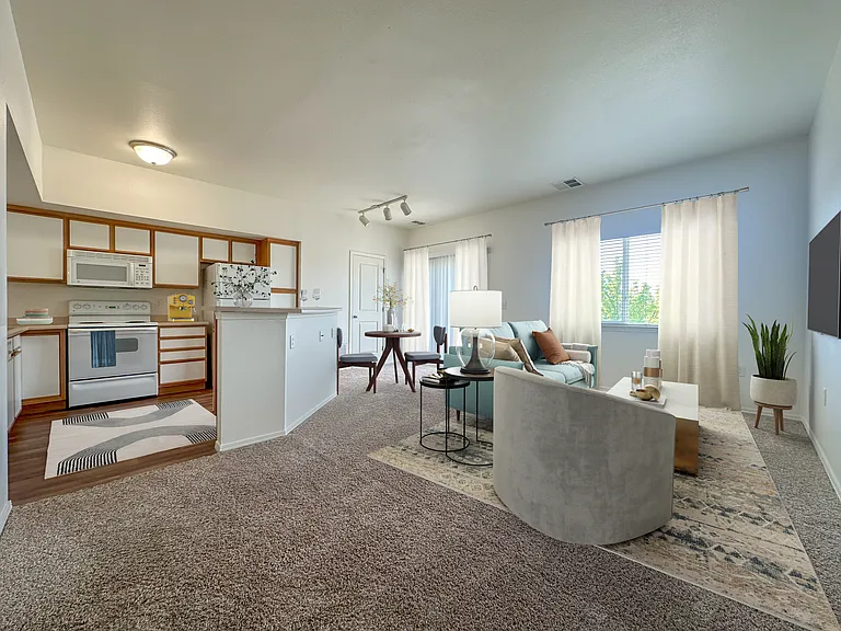 Liberty Hill Apartments, Draper, Utah, living room with a grey carpet and a white sofa.