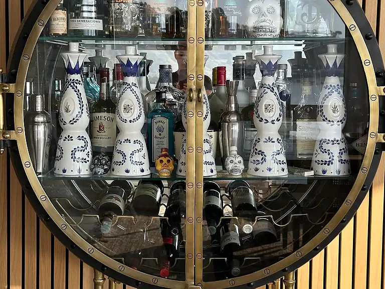 Indulge in sophistication at the liquor cabinet, where refined choices meet elevated moments.