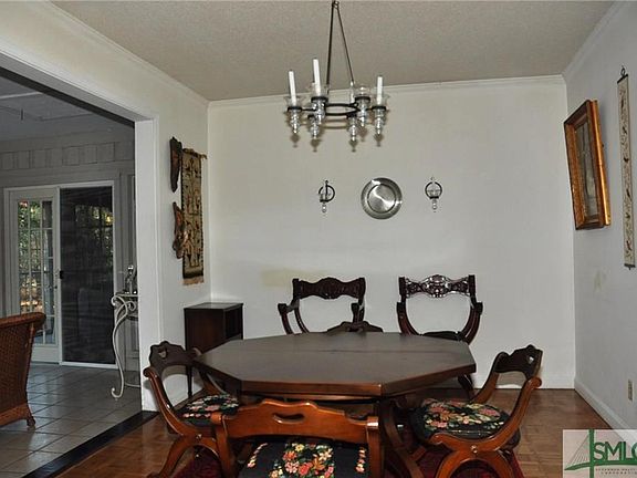 Dining area opens to the Sunroom