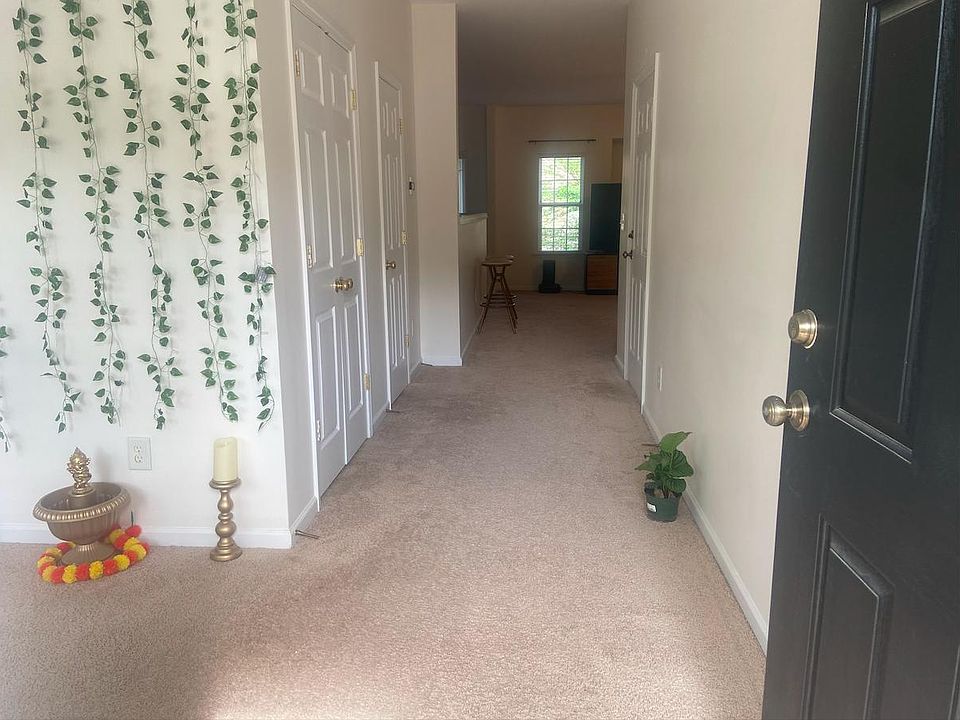 Foyer (the first door to the left is coat closet and the next door is a half bathroom)