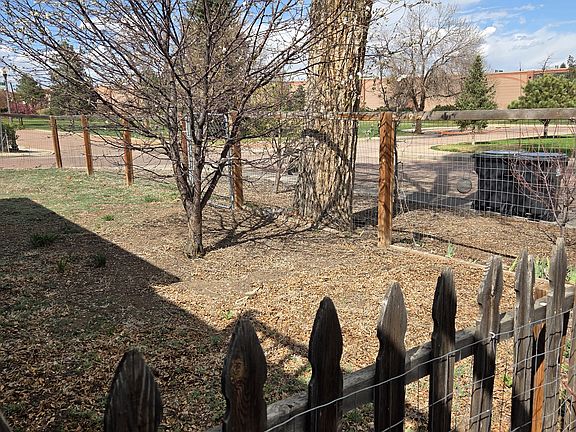 Fenced in front yard overlooking a quiet cul de sac