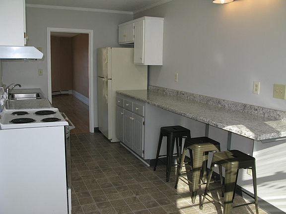 Newly remodeled kitchen with counter seating.