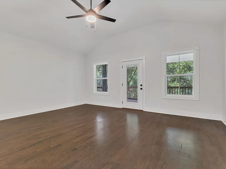Bedroom #2 (or bonus room) - top of stairs. Large screen porch out exterior door - overlooking downtown Nashville.