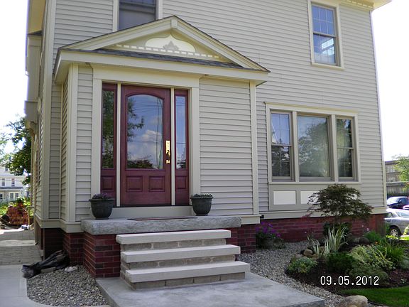 Custom gable, limestone step