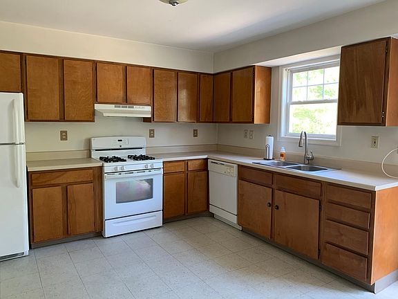 Spacious, bright kitchen. Gas stove. Dishwasher. Tons of storage, including a pantry closet.