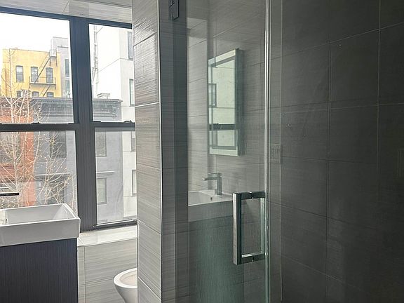 3rd image of 411 E 118th St APT 13